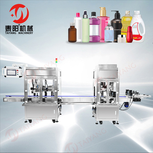 高速双头追踪灌装旋盖一体机